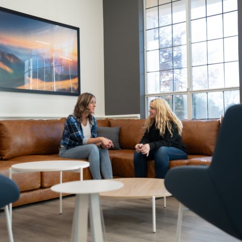 two people talking at guardian recovery